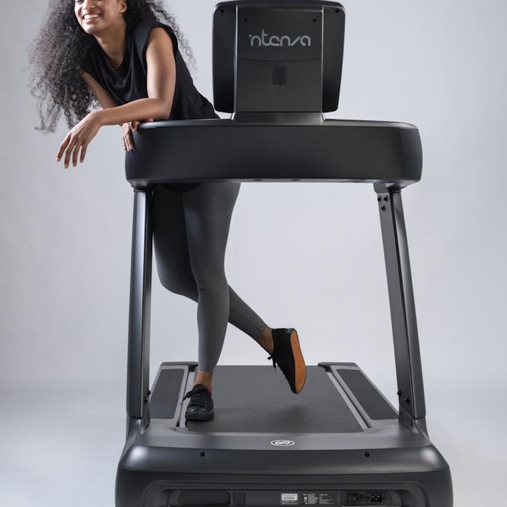 Interior of a professional gym with weight training equipment and mirrors