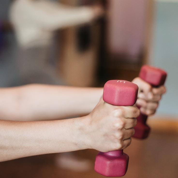 Group fitness class in a modern studio setting
